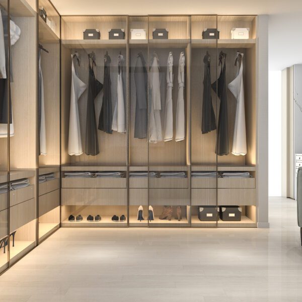 Scandinavian-style wood walk-in closet with glass doors, built-in lighting, and modern wardrobe organization.