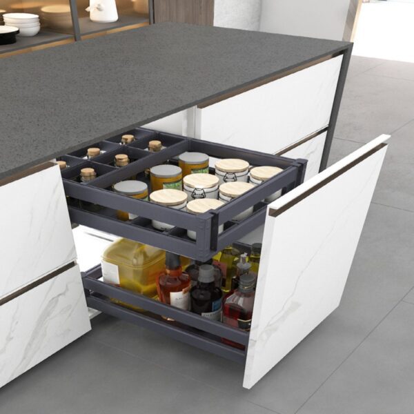 Modern pull-out pantry organizer with neatly arranged spice jars, bottles, and condiments in a sleek kitchen cabinet.