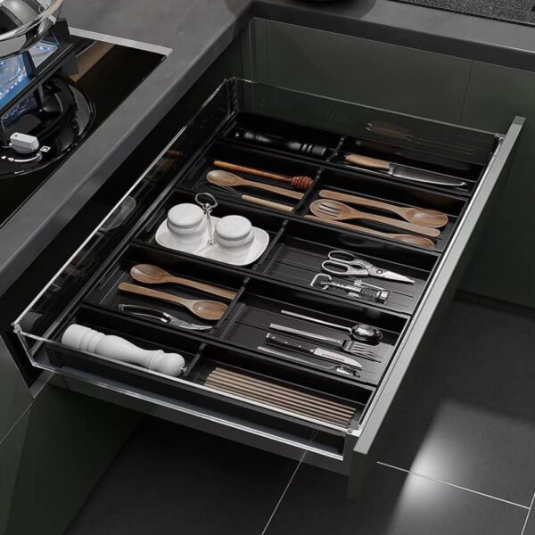 Elegant kitchen drawer organizer with multiple compartments for utensils, cutlery, and kitchen tools, ensuring a neat and stylish storage solution.