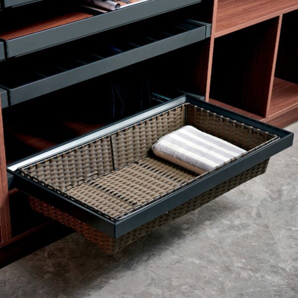 Stylish pull-out wicker storage drawer, perfect for organizing towels, clothes, or accessories in a modern wardrobe.