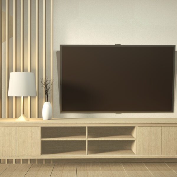 A minimalist Japanese-style TV wall cabinet made of light wood, featuring open shelves and closed storage compartments, set against a neutral-toned wall with elegant vertical paneling.